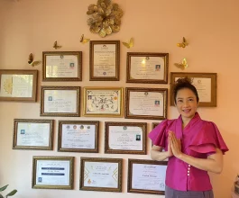 Atipa with her numerous Thai Massage diplomas